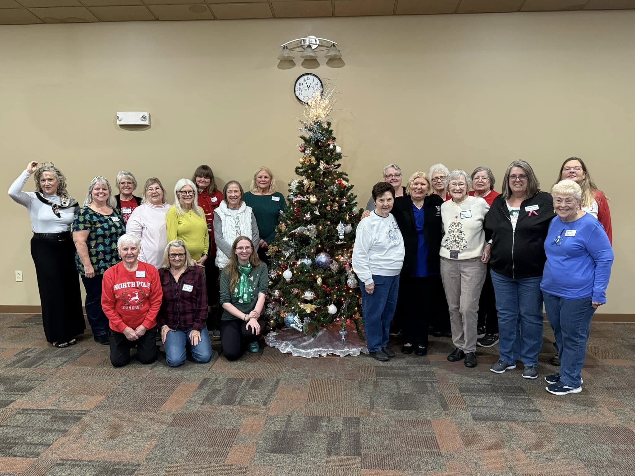 The Thread and Thimble homemakers around a christmas tree