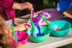 Paints in bowls on a table